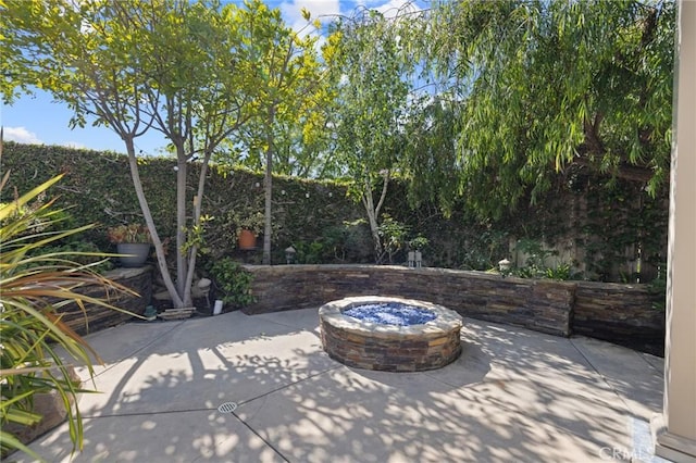 29 Hemingway Ct, Trabuco Canyon, CA 92679 - view of patio with a fire pit