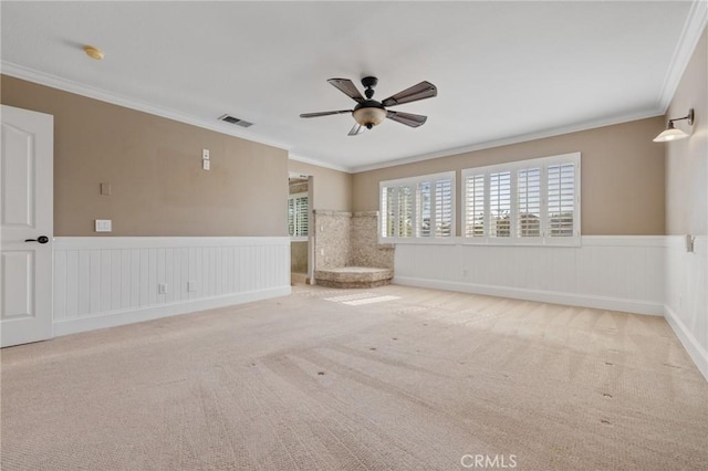 29 Hemingway Ct, Trabuco Canyon, CA 92679 - unfurnished room with ceiling fan, wainscoting, ornamental molding, and carpet floors