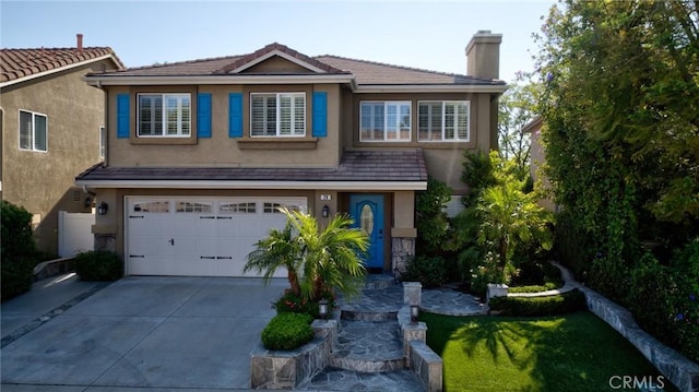 29 Hemingway Ct, Trabuco Canyon, CA 92679 - traditional-style home featuring stucco siding, an attached garage, driveway, and a chimney