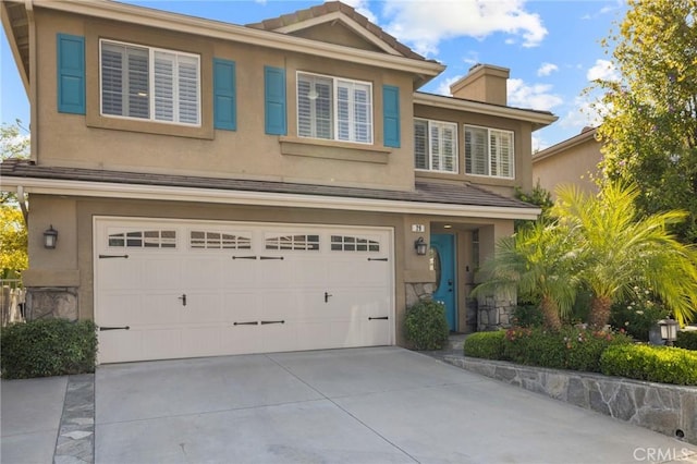 29 Hemingway Ct, Trabuco Canyon, CA 92679 - traditional home with stucco siding, a garage, a chimney, and concrete driveway