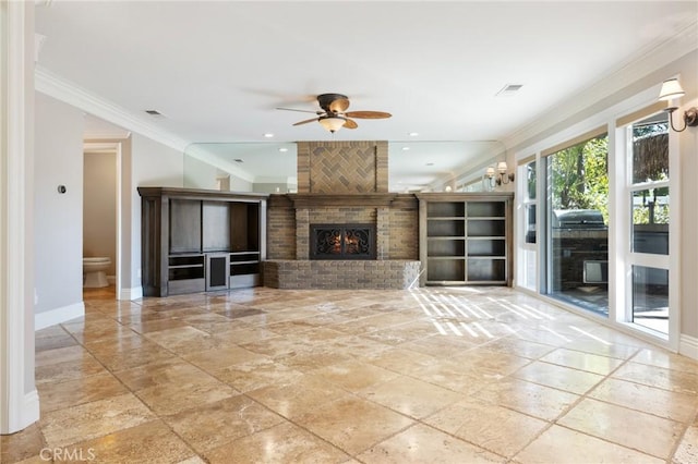 29 Hemingway Ct, Trabuco Canyon, CA 92679 - unfurnished living room featuring crown molding, ceiling fan, stone tile floors, a brick fireplace, and recessed lighting
