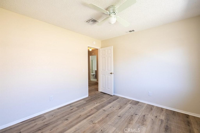 43920 Delgado Ct, Lancaster, CA 93535 - empty room with light wood finished floors and ceiling fan