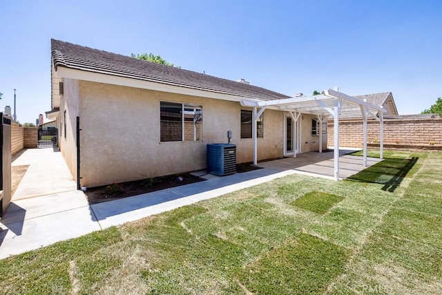 43920 Delgado Ct, Lancaster, CA 93535 - rear view of property with stucco siding, a pergola, a fenced backyard, and a patio