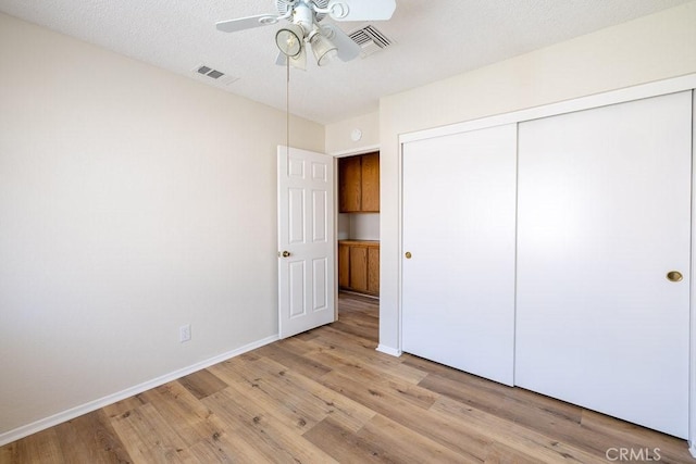 43920 Delgado Ct, Lancaster, CA 93535 - unfurnished bedroom featuring light wood-style flooring, a closet, and a ceiling fan