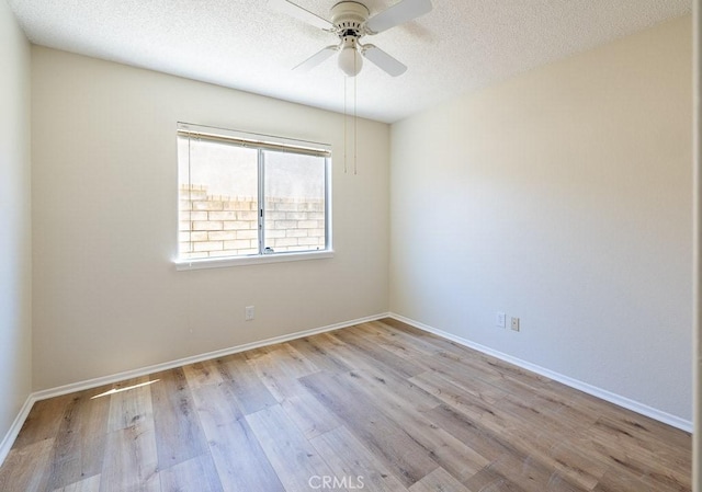 43920 Delgado Ct, Lancaster, CA 93535 - unfurnished room featuring ceiling fan, wood finished floors, and a textured ceiling