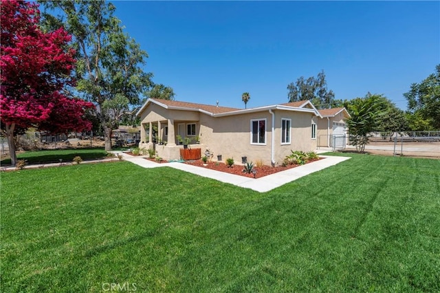 11267 Huguley Dr, Riverside, CA 92505 - rear view of house featuring stucco siding