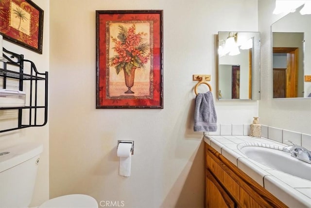 7575 Whitney Ave, Yucca Valley, CA 92284 - bathroom with toilet and vanity