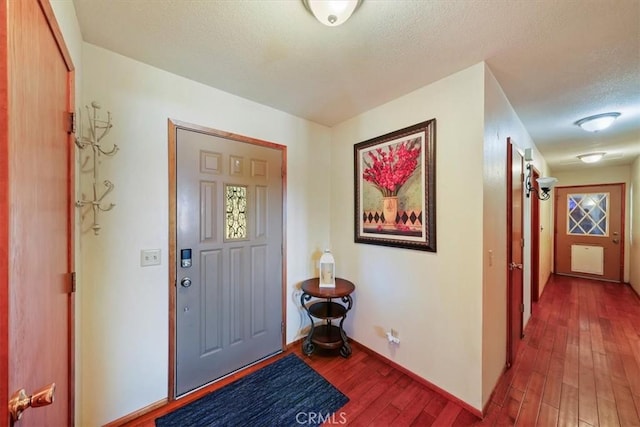7575 Whitney Ave, Yucca Valley, CA 92284 - foyer featuring hardwood / wood-style flooring and a textured ceiling