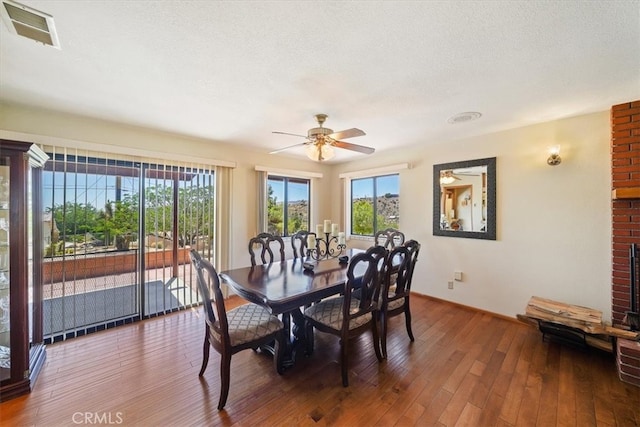 7575 Whitney Ave, Yucca Valley, CA 92284 - dining area with ceiling fan, hardwood / wood-style flooring, and a textured ceiling