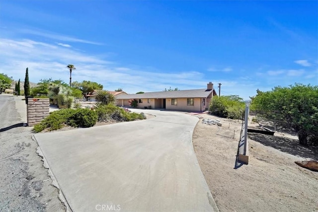 7575 Whitney Ave, Yucca Valley, CA 92284 - single story home with a chimney