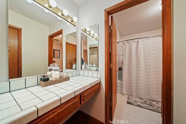 7575 Whitney Ave, Yucca Valley, CA 92284 - bathroom featuring vanity, a shower with curtain, and tile patterned floors