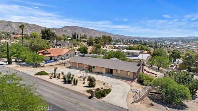 7575 Whitney Ave, Yucca Valley, CA 92284 - aerial perspective of suburban area with a mountain backdrop