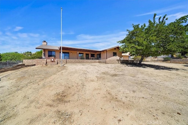 7575 Whitney Ave, Yucca Valley, CA 92284 - single story home featuring a chimney