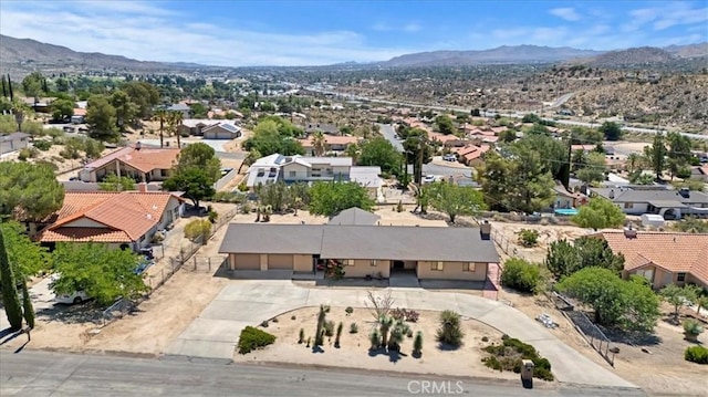 7575 Whitney Ave, Yucca Valley, CA 92284 - aerial perspective of suburban area featuring a mountain backdrop