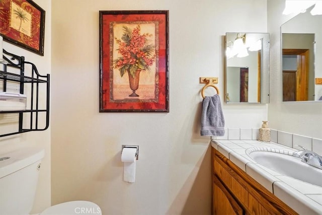 7575 Whitney Ave, Yucca Valley, CA 92284 - half bath featuring toilet and vanity