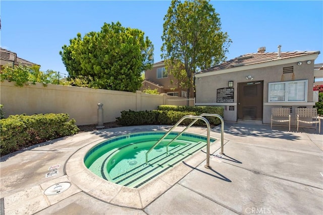 18 Rue Brittany, Lake Forest, CA 92610 - view of swimming pool with a hot tub