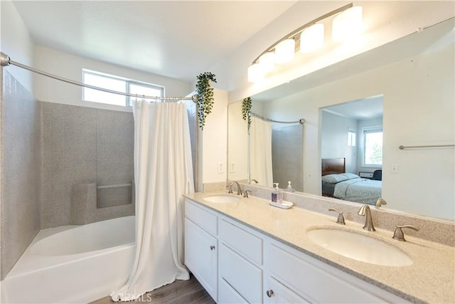 18 Rue Brittany, Lake Forest, CA 92610 - ensuite bathroom featuring shower / tub combo with curtain and double vanity