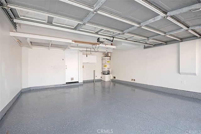18 Rue Brittany, Lake Forest, CA 92610 - garage featuring water heater and a garage door opener