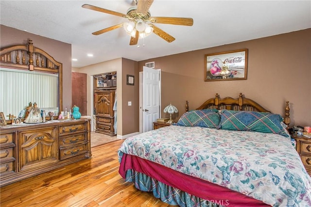 10735 Juniper Ave, Fontana, CA 92337 - bedroom with light wood finished floors and recessed lighting