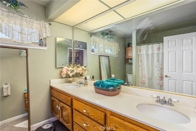 10735 Juniper Ave, Fontana, CA 92337 - full bath featuring double vanity, tile patterned floors, and a shower with shower curtain