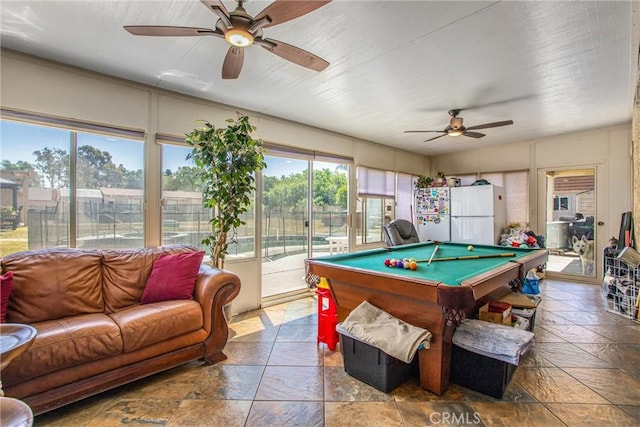 10735 Juniper Ave, Fontana, CA 92337 - playroom with ceiling fan, plenty of natural light, pool table, and stone tile flooring