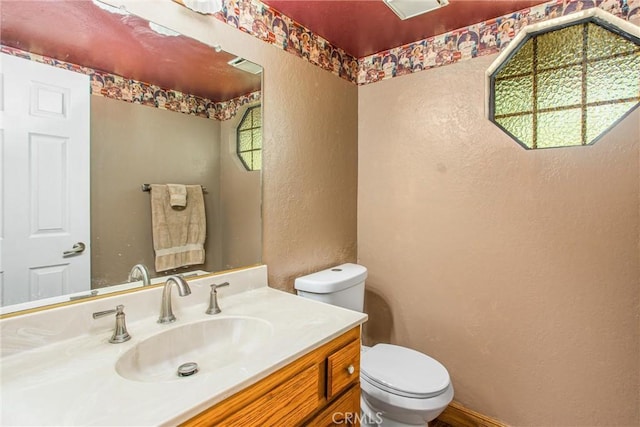 10735 Juniper Ave, Fontana, CA 92337 - half bathroom featuring a textured wall and vanity