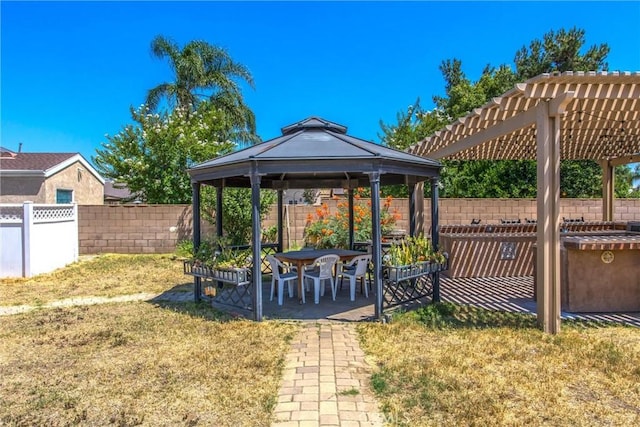 10735 Juniper Ave, Fontana, CA 92337 - fenced backyard with a gazebo, a pergola, and a patio area