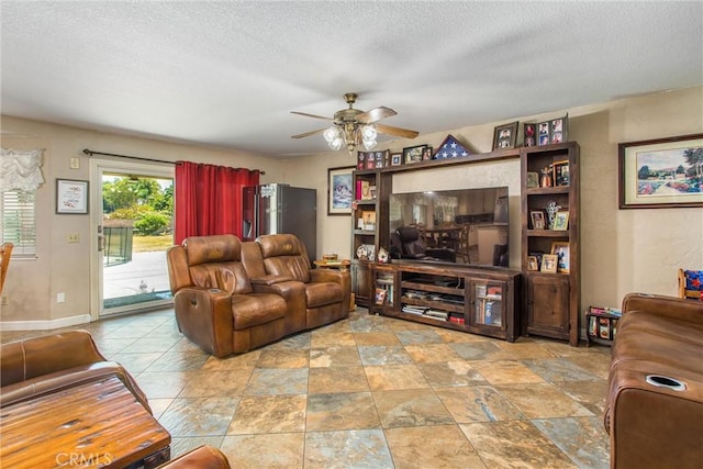 10735 Juniper Ave, Fontana, CA 92337 - living room with a ceiling fan and a textured ceiling