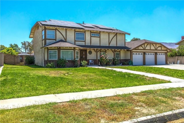 10735 Juniper Ave, Fontana, CA 92337 - english style home with stucco siding, a garage, concrete driveway, and roof mounted solar panels