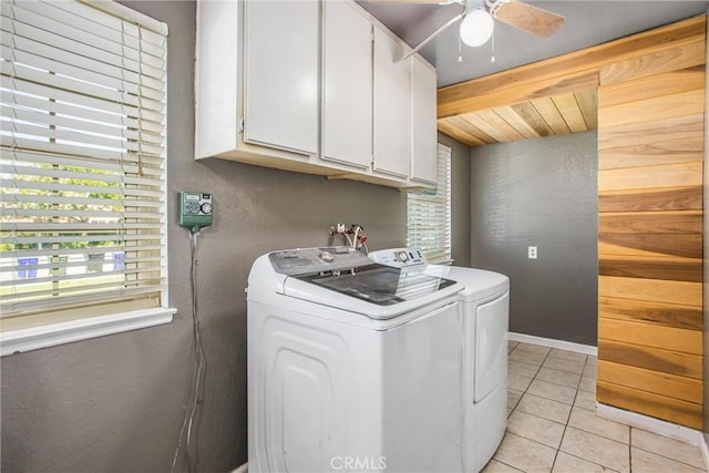 10735 Juniper Ave, Fontana, CA 92337 - washroom featuring independent washer and dryer, cabinet space, light tile patterned floors, ceiling fan, and a textured wall