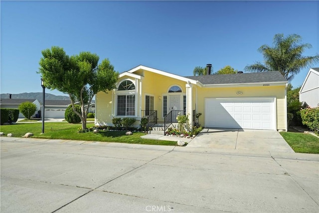 20060 Canyon View Dr, Canyon Country, CA 91351 - single story home featuring a garage, driveway, and a front lawn
