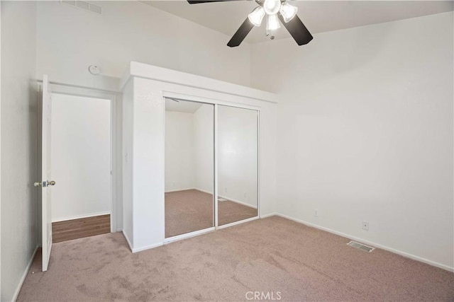 20060 Canyon View Dr, Canyon Country, CA 91351 - unfurnished bedroom with carpet floors, a closet, and a ceiling fan