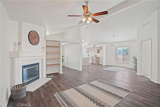 20060 Canyon View Dr, Canyon Country, CA 91351 - unfurnished living room featuring lofted ceiling, ceiling fan, dark wood finished floors, and a fireplace