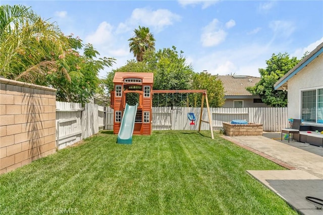 22792 Springdale Dr, Moreno Valley, CA 92557 - fenced backyard with a playground and a patio area