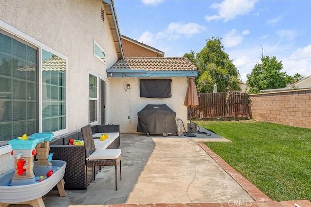 22792 Springdale Dr, Moreno Valley, CA 92557 - fenced backyard with a patio and a grill