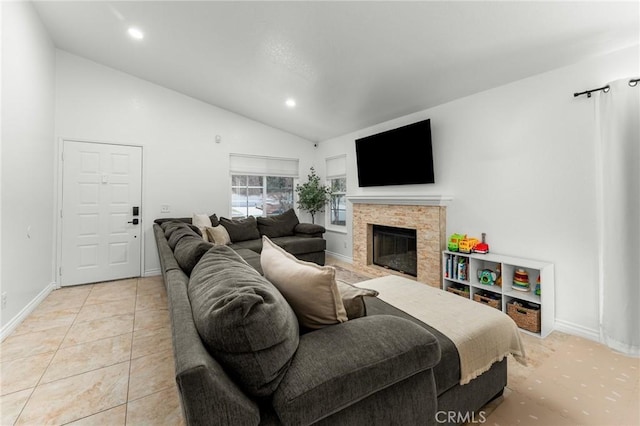 22792 Springdale Dr, Moreno Valley, CA 92557 - living area featuring a fireplace with flush hearth, vaulted ceiling, and recessed lighting