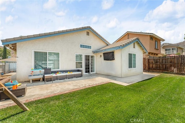 22792 Springdale Dr, Moreno Valley, CA 92557 - back of property featuring an outdoor hangout area, a fenced backyard, stucco siding, and a patio