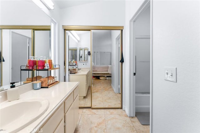 22792 Springdale Dr, Moreno Valley, CA 92557 - full bathroom with vanity, tile patterned floors, and ensuite bathroom