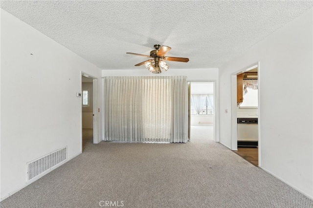 1181 Sandlewood Dr, Hemet, CA 92543 - carpeted spare room featuring ceiling fan and a textured ceiling
