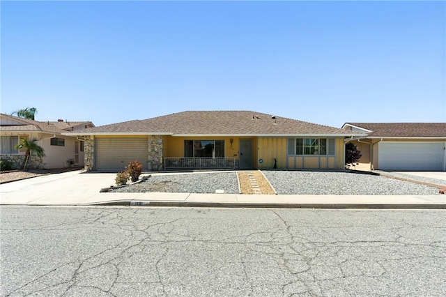 1181 Sandlewood Dr, Hemet, CA 92543 - ranch-style home featuring concrete driveway, a garage, and board and batten siding