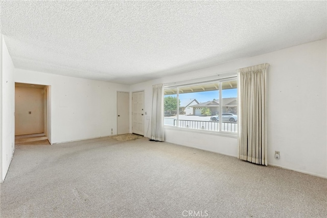 1181 Sandlewood Dr, Hemet, CA 92543 - unfurnished room featuring carpet flooring and a textured ceiling