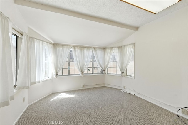 1181 Sandlewood Dr, Hemet, CA 92543 - empty room with carpet flooring, vaulted ceiling, and a textured ceiling