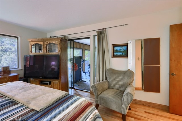 35484 Rd 274, North Fork, CA 93643 - bedroom with access to exterior and light wood-style flooring