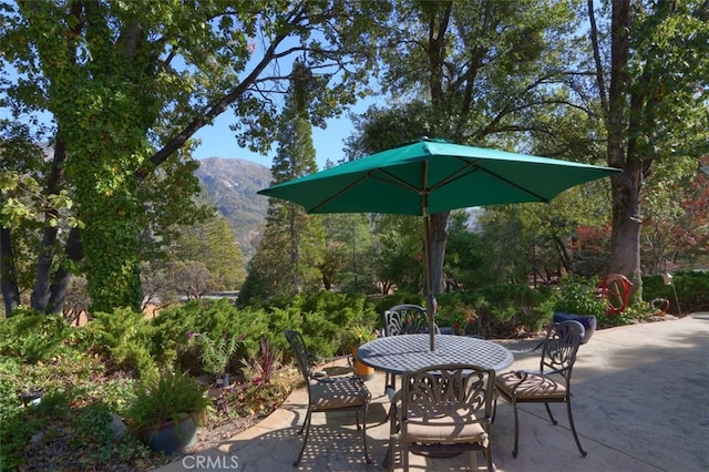 35484 Rd 274, North Fork, CA 93643 - view of patio with a mountain view and outdoor dining area