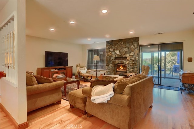 35484 Rd 274, North Fork, CA 93643 - living room featuring light wood finished floors, recessed lighting, and a fireplace