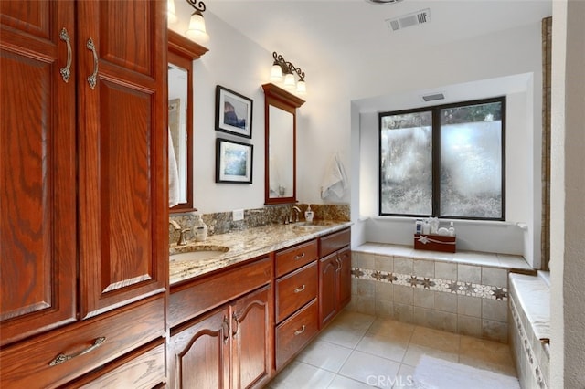 35484 Rd 274, North Fork, CA 93643 - bathroom with tile patterned floors, double vanity, and a relaxing tiled tub