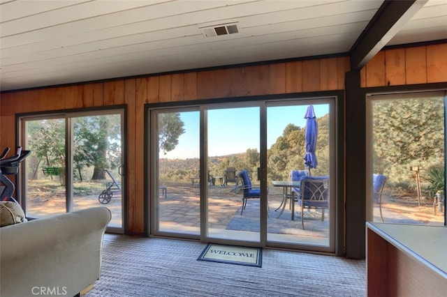 35484 Rd 274, North Fork, CA 93643 - doorway with wood walls and carpet flooring