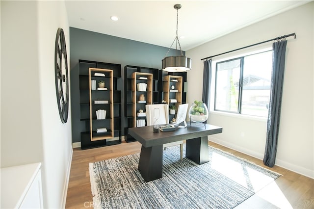 7051 Hurley Ct, San Bernardino, CA 92407 - home office with wood finished floors and recessed lighting