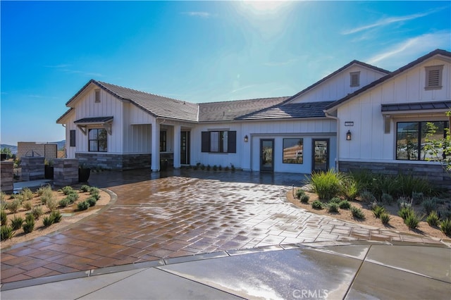 7051 Hurley Ct, San Bernardino, CA 92407 - modern inspired farmhouse with board and batten siding and stone siding