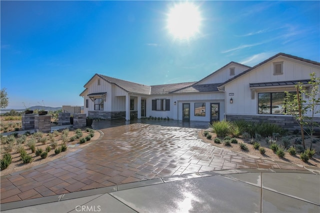 7051 Hurley Ct, San Bernardino, CA 92407 - modern inspired farmhouse featuring board and batten siding and stone siding